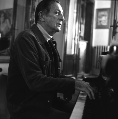 Alain Daniélou playing the piano at Zagarolo. Photo by Jacques Cloarec.